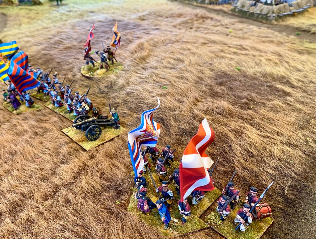 The besieging Polish troops stand ready to repel the relief column.