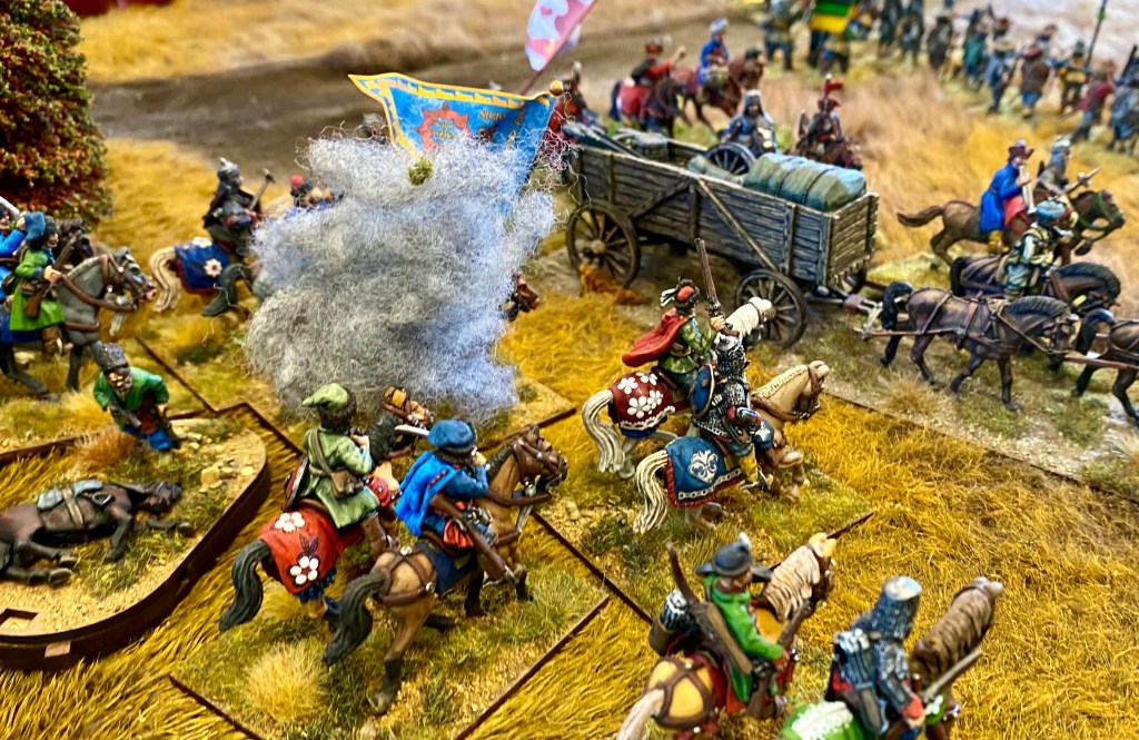 The Polish cossacks finish off the trayne guards and loot the baggage wagons!