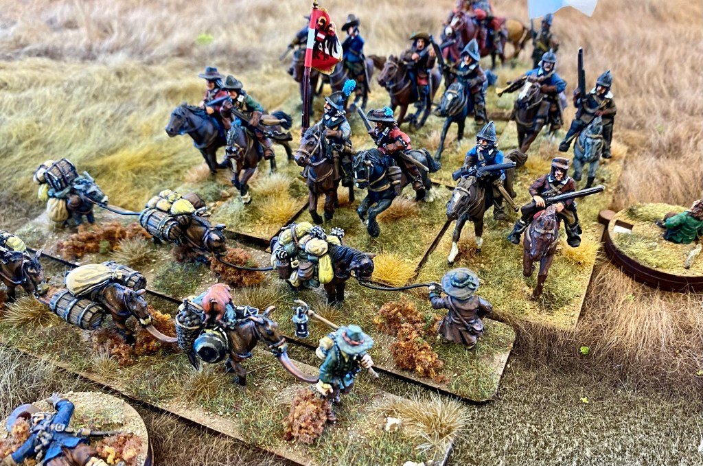 Disaster!  While the Swedish horse are chasing off the Polish cossacks, the Rajtar break through to the remaining baggage.