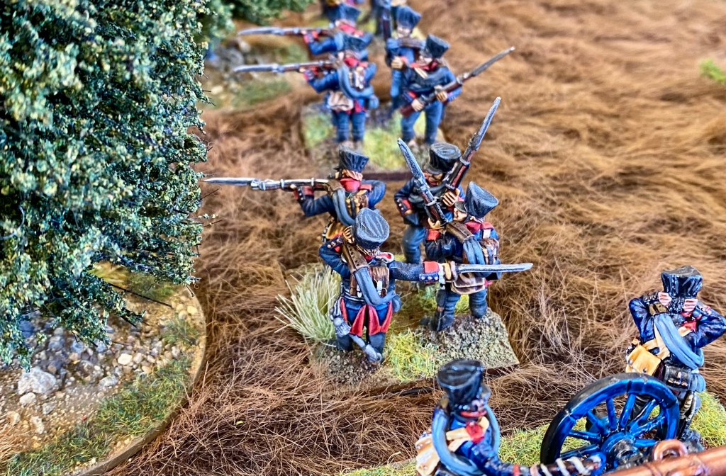 Fusiliers prepare to enter the woods