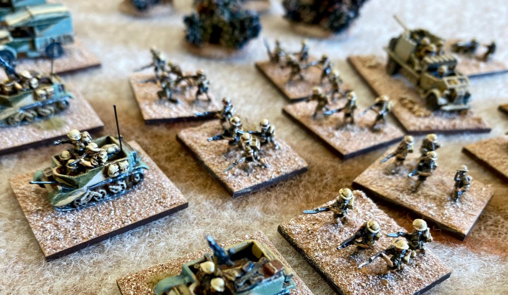 8th Army Carriers and infantry 