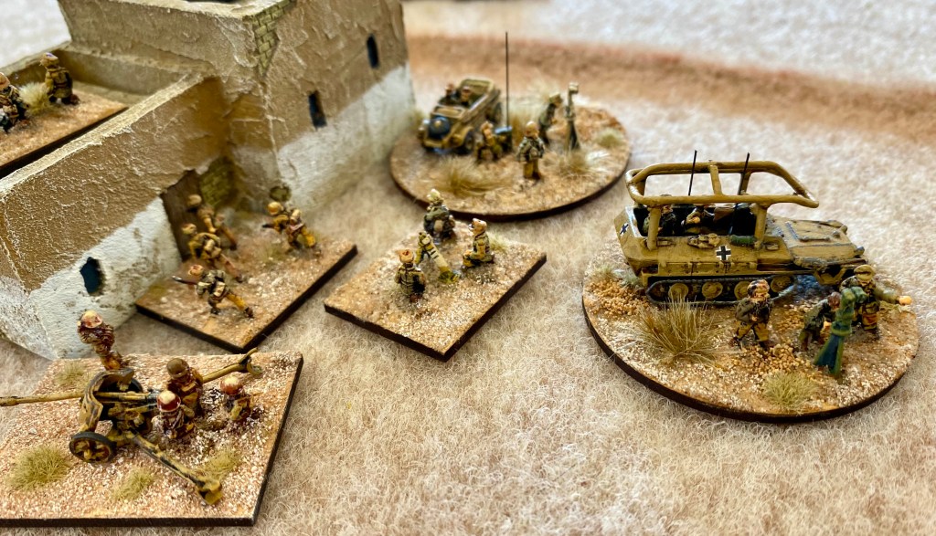 The DAK take up defence in an abandoned village