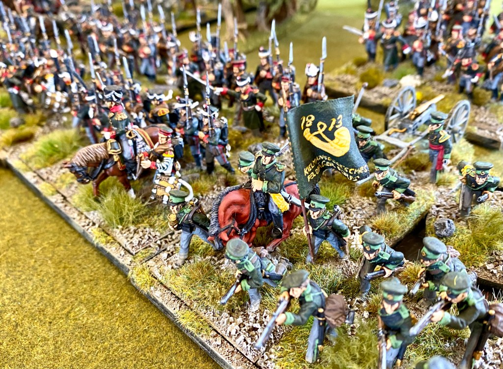 Russian legion troops marching on to the field.