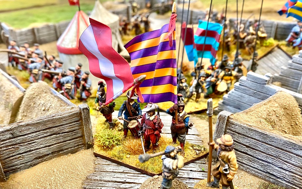 The garrison defiantly displaying their colours. 