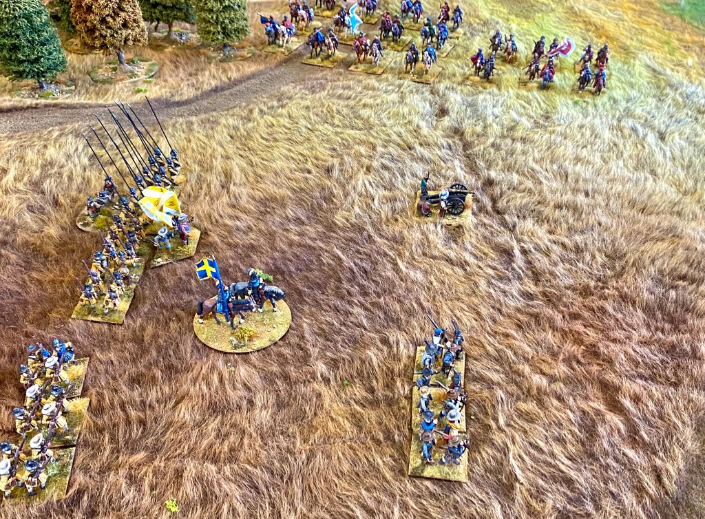 Polish cossack cavalry appear on the Swedish flank to harass the attackers.