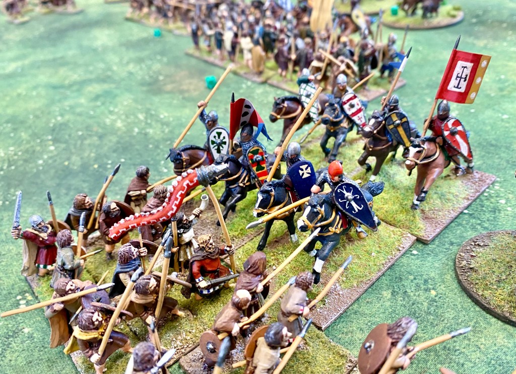 More Welsh infantry stand firm against the ferocious charging Normans.