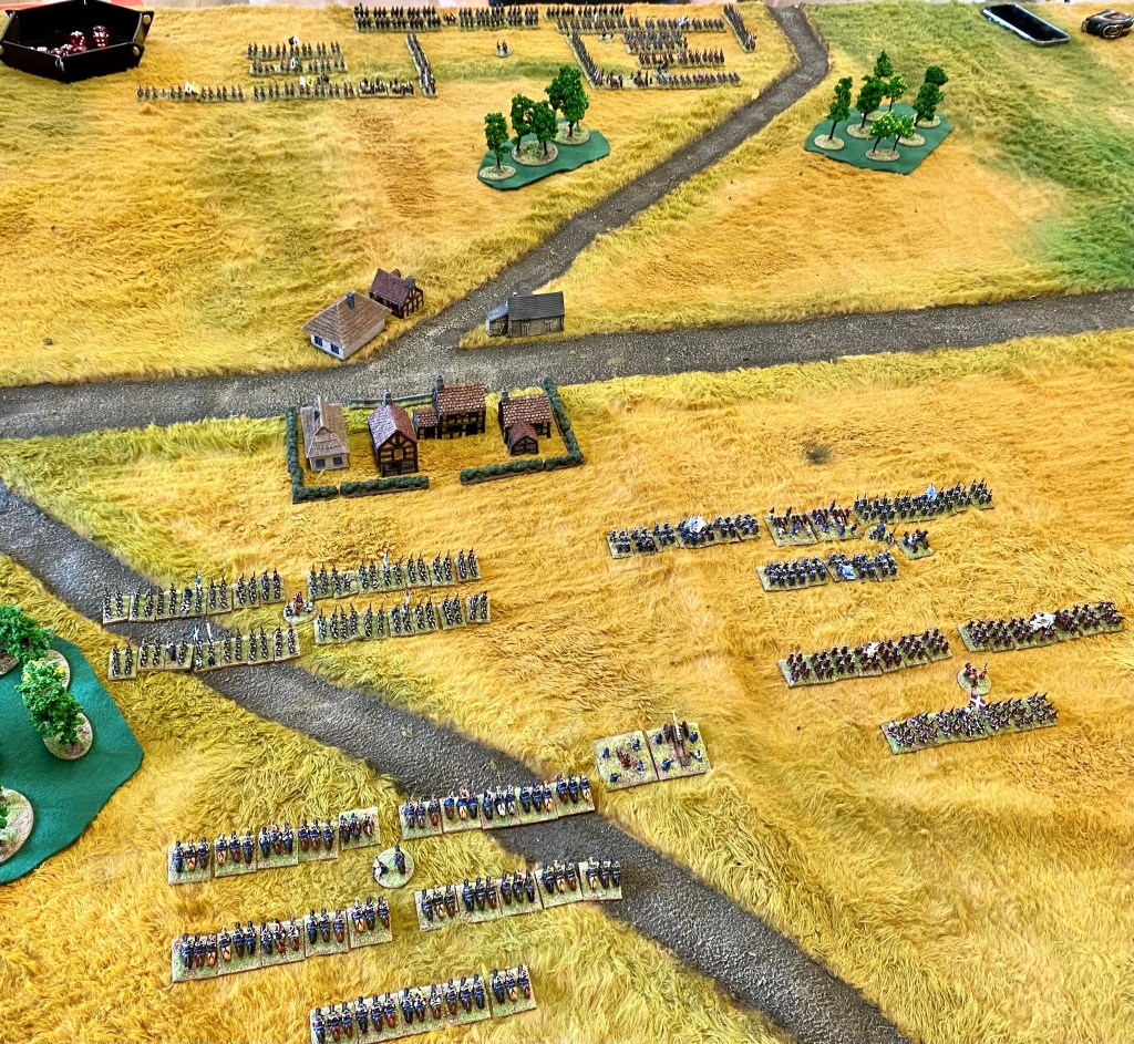 The armies at deployment with the French nearest the camera and the Allies massing in the distance.