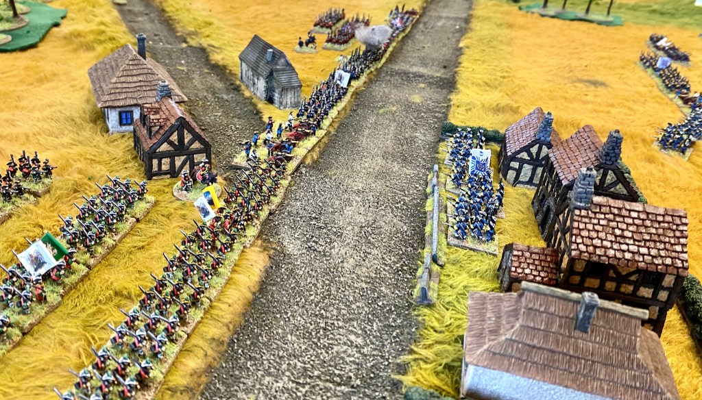 The Allies mass their firepower against the French in the village. 