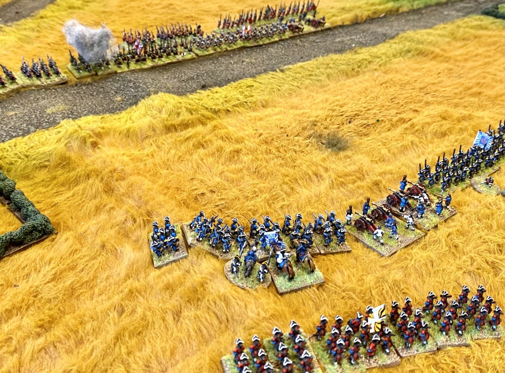 The lead French brigade on their right  start the unequal firefight with the superior Allied infantry. 