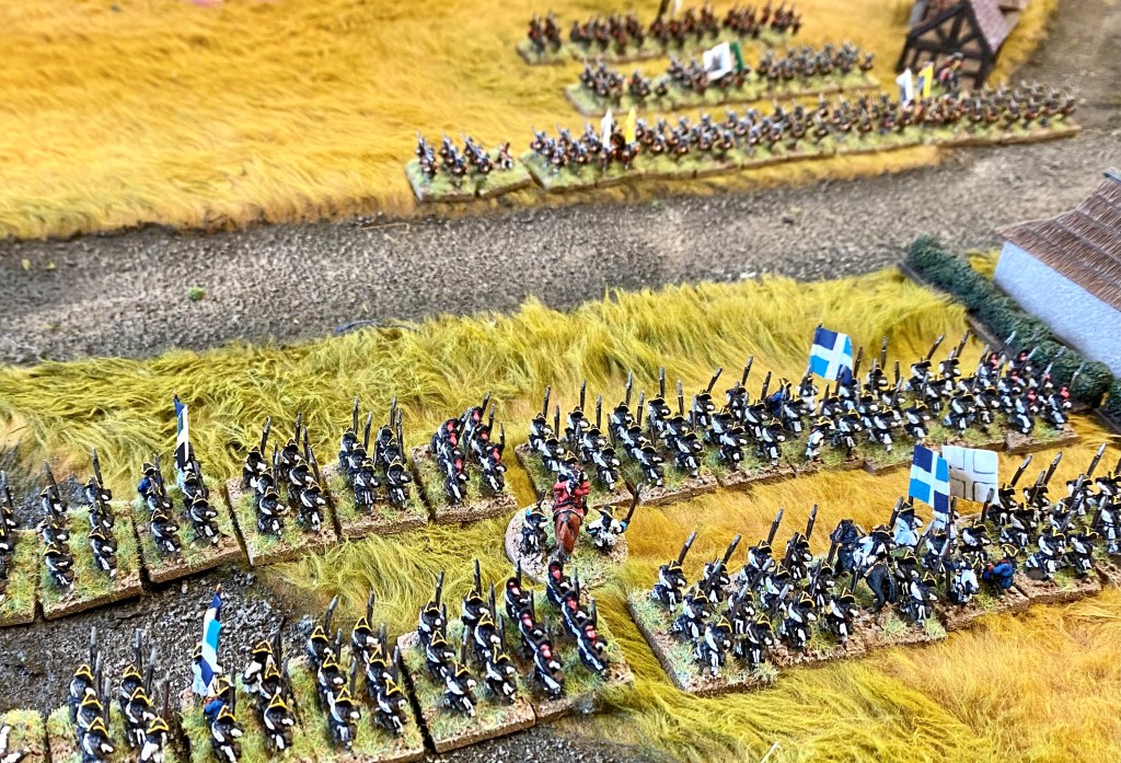 The French left flank advances to support their colleagues in the village and threaten the Allied right.